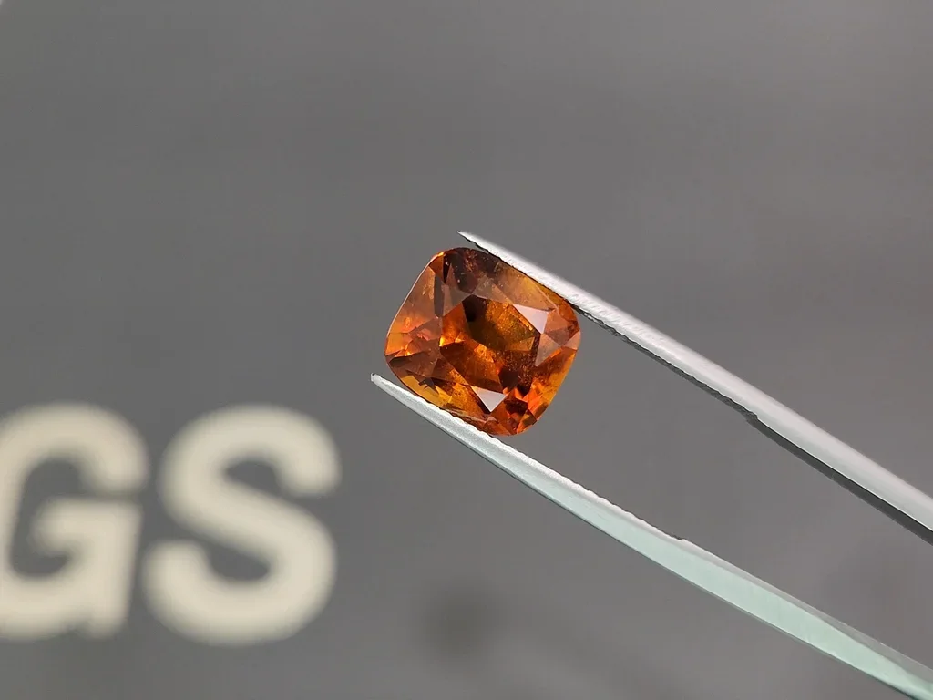 Deep orange clinohumite in cushion cut 6.77 carats, Afghanistan 3