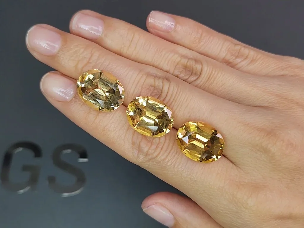 Set of yellow citrines in a high-precision cut oval 27.53 carats, Africa 2