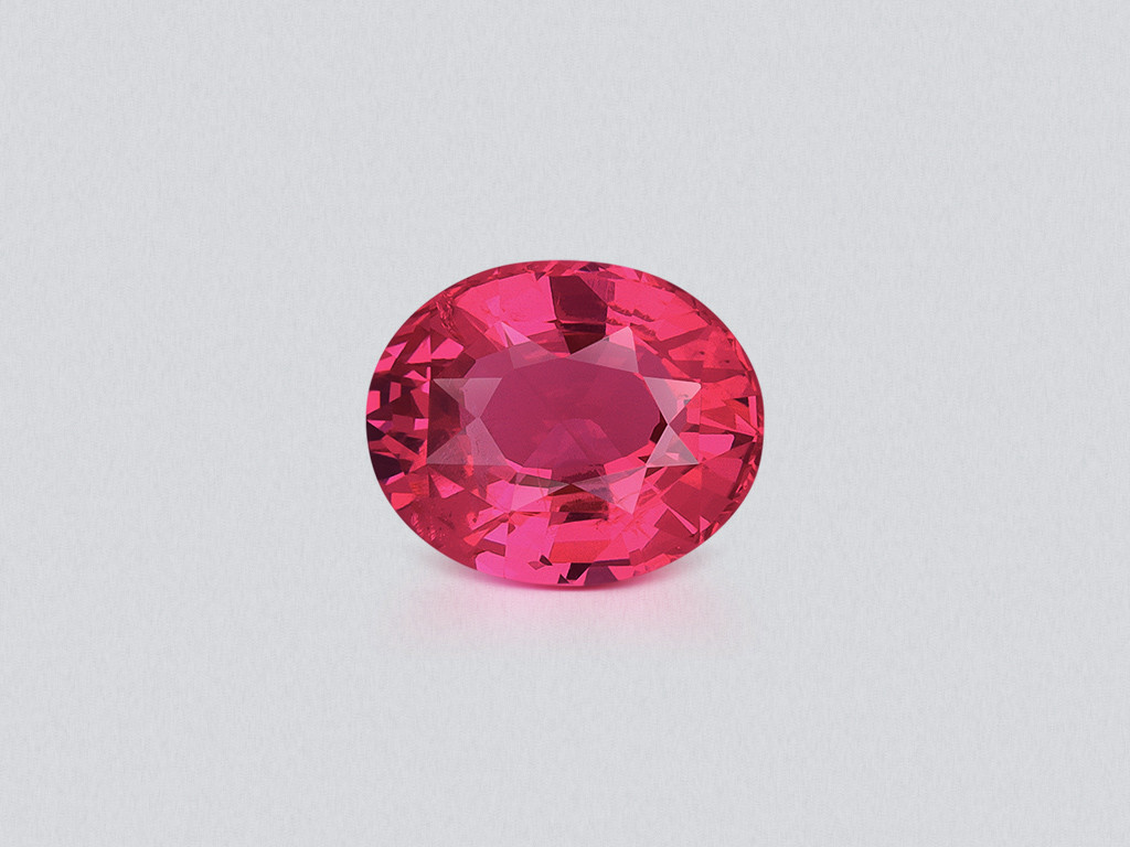 Vibrant Intense pinkish red Mahenge spinel in oval cut 2.01 carats, Tanzania