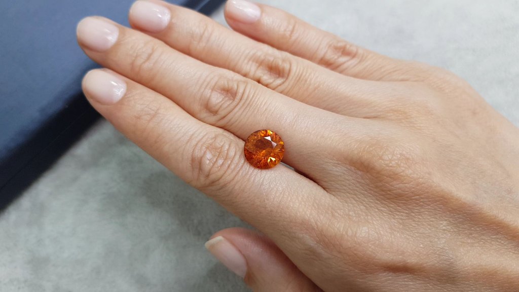 Vivid orange clinohumite 4.24 ct in round cut, Afghanistan 2