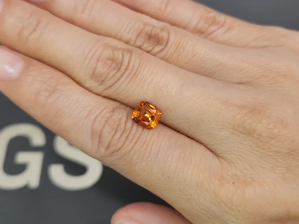 Vivid orange clinohumite in cushion cut 1.63 carats, Afghanistan 2