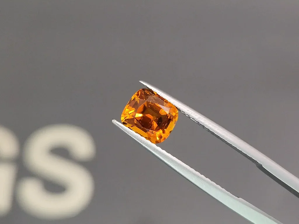 Vivid orange clinohumite in cushion cut 1.63 carats, Afghanistan 3