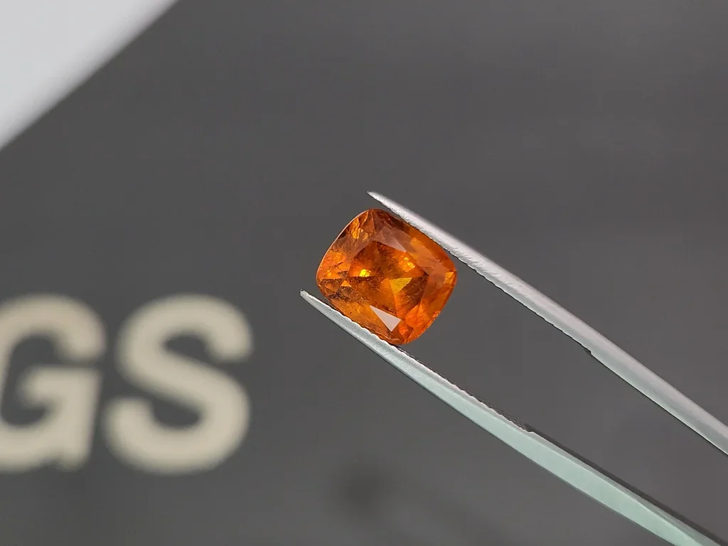 Vivid orange clinohumite in cushion-cut 4.59 carats, Afghanistan 3